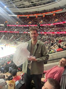 Olivier from Glowtify (L-SPARK cohort 11 startup) wins at Sens hockey game